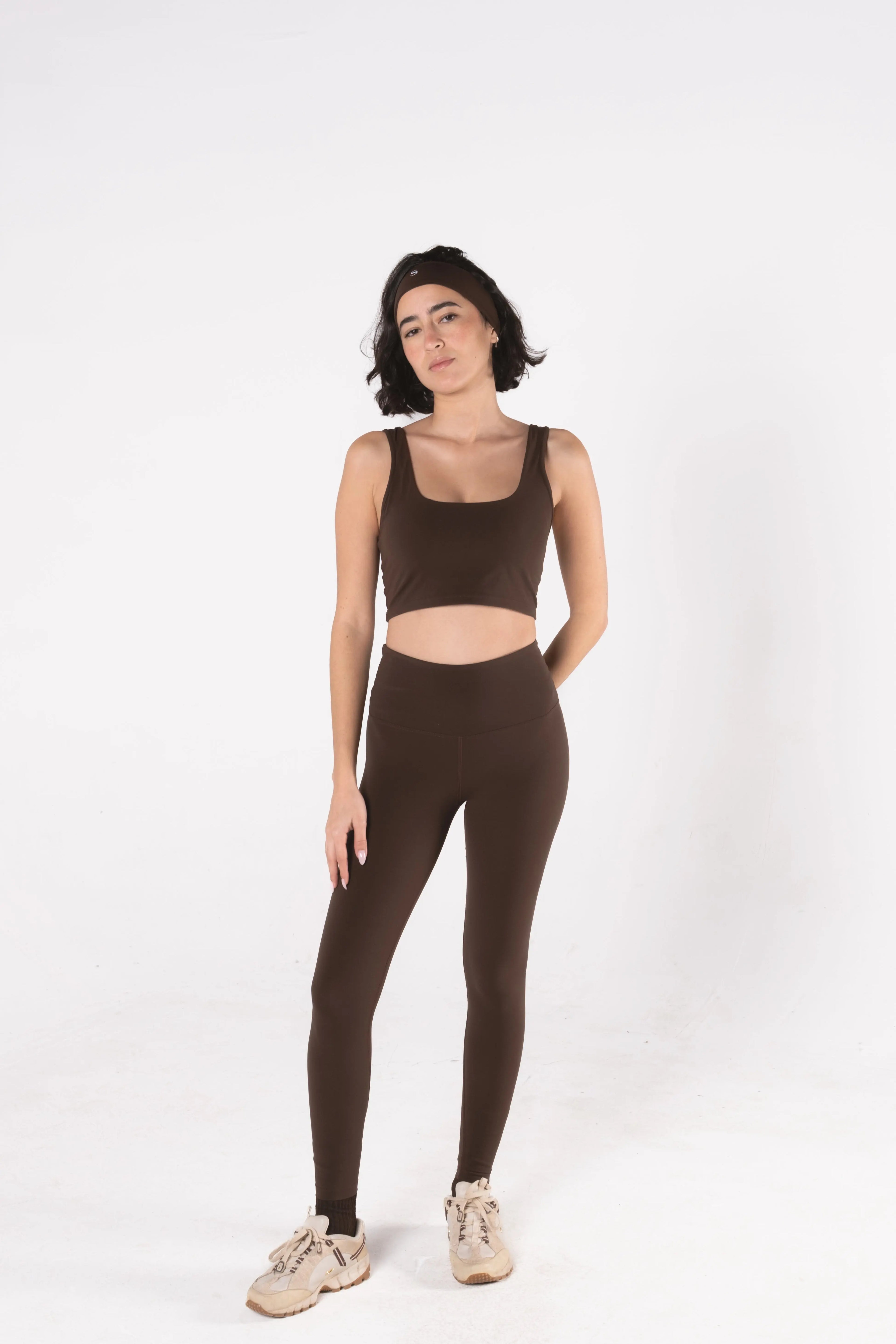 Woman wearing LESS Activewear Form Sculpting Leggings, second skin feel high waist design