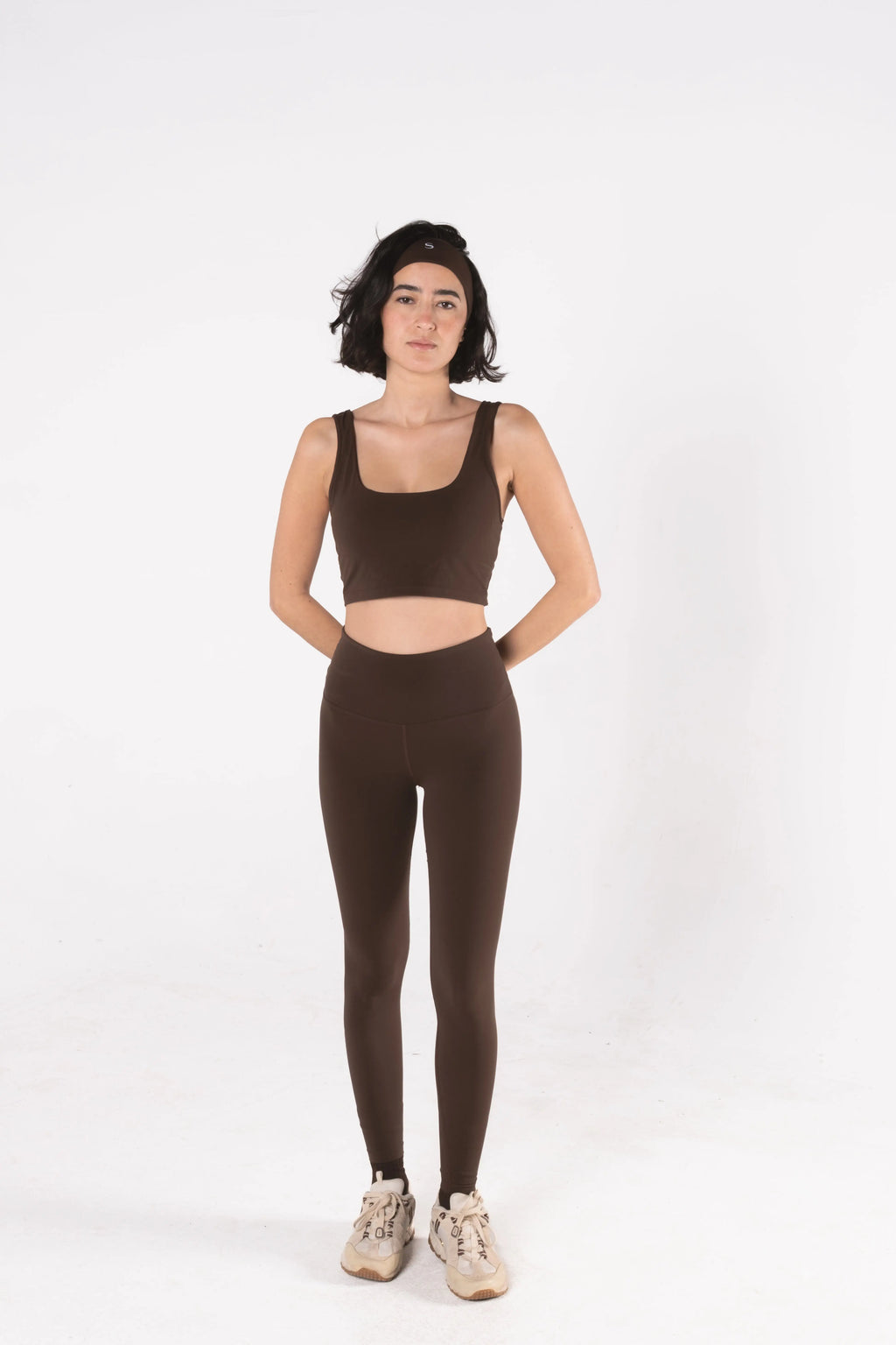 Woman wearing LESS Activewear Form Sculpting Leggings, second skin feel high waist design