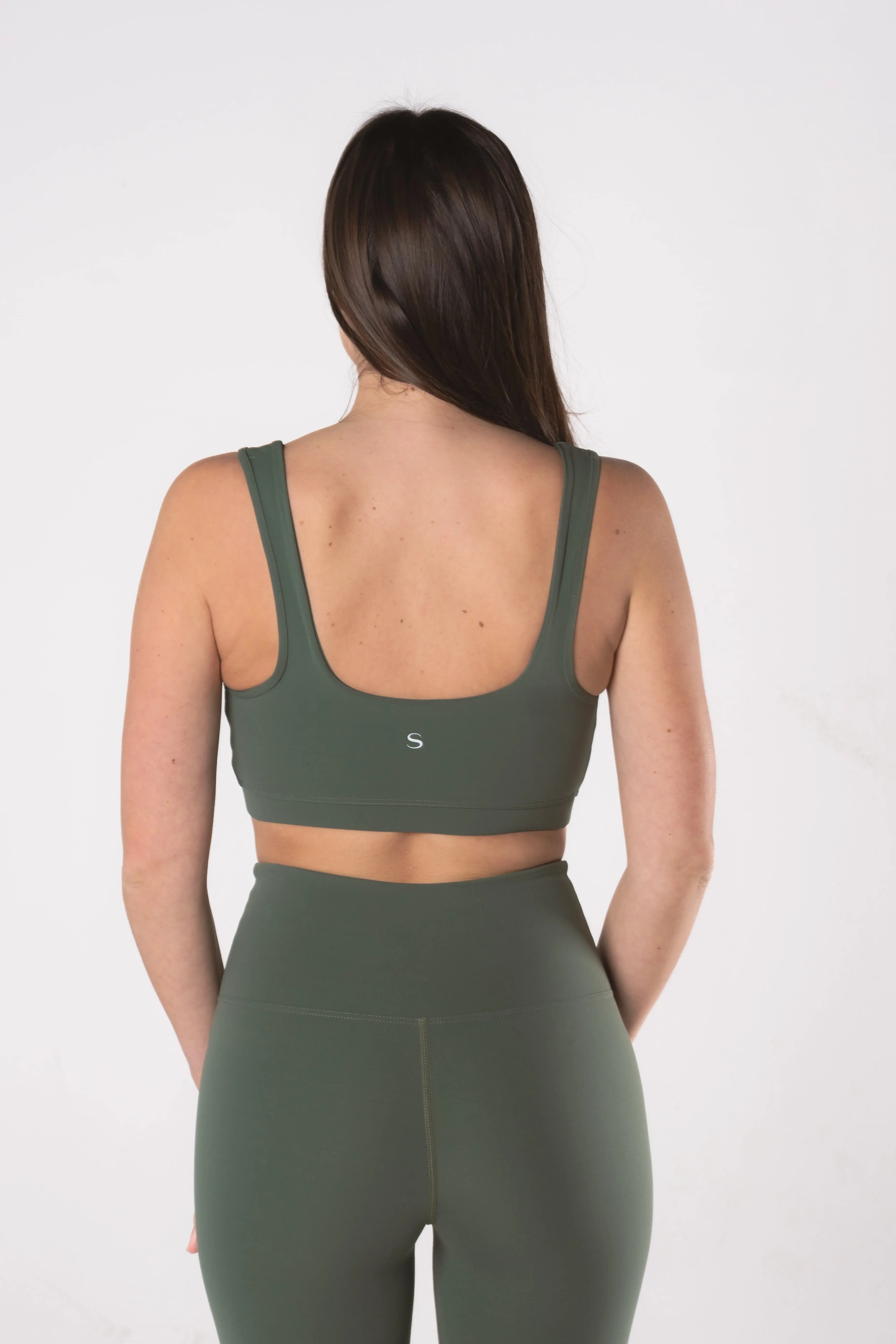 Woman wearing LESS Activewear Line Trousers, wide-leg minimalist active pants